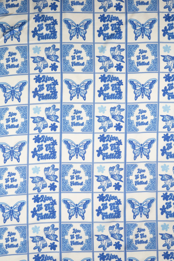 Printed Spanish Polyester Satin Charmeuse - Live to the Fullest Blue